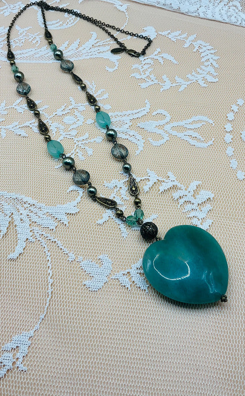 Vintage NEXT Green Heart Pendant Necklace – Boho Layered Bead Design