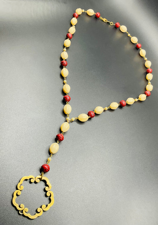 Boho Beaded Y Necklace – Deep Red & Cream with Geometric Gold Pendant